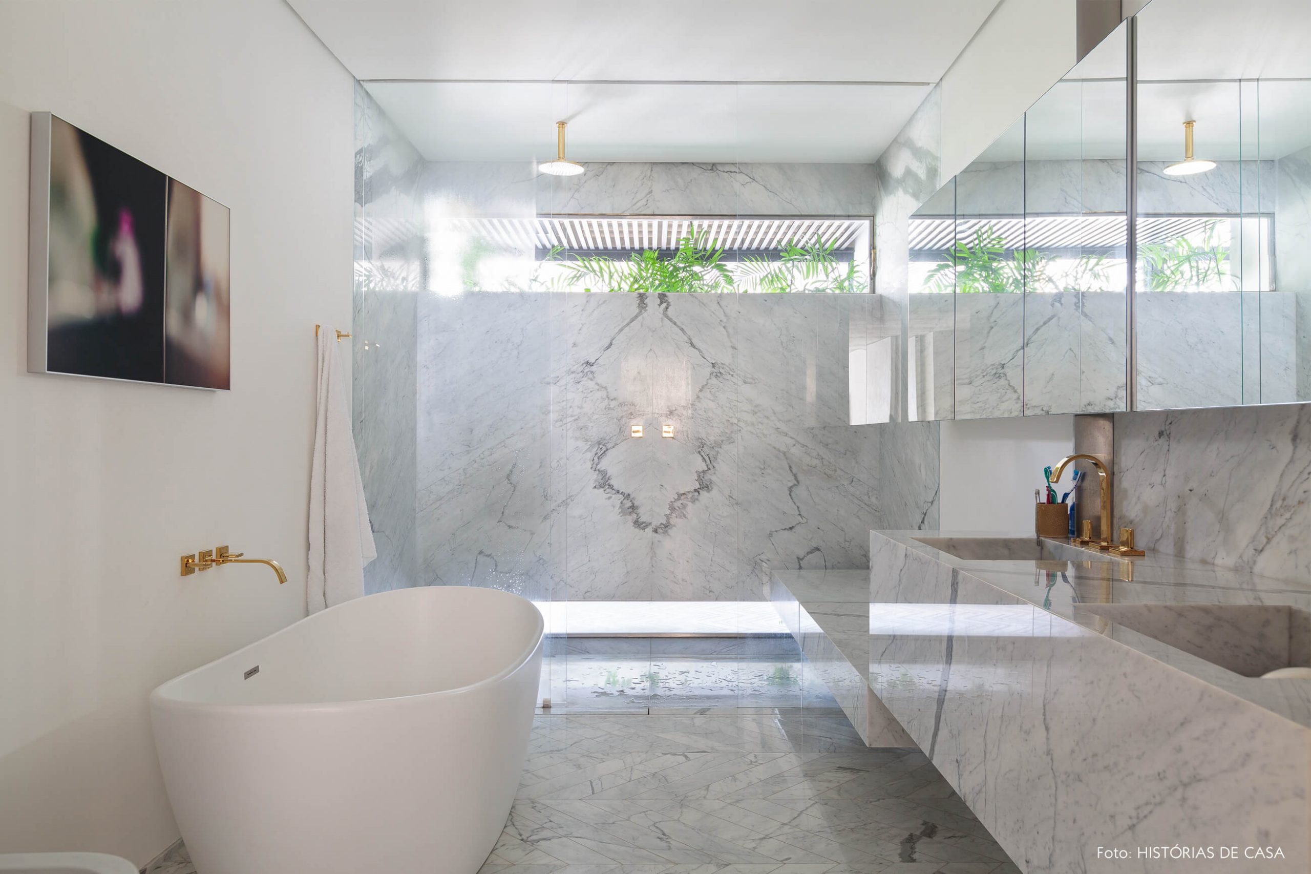 decoração ap banheiro com bancada, piso e parede de marmore