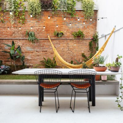 decoração quintal rede parede tijolos